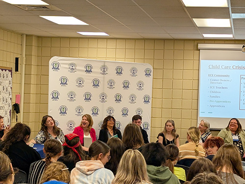 Student panel speaking to community members