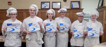 Cassandra Waid, Seth Benson, Robert Spaeth, Ryan Batt, Kaelyn Bonawitz, Makayla Alcorn holding up their certificates.