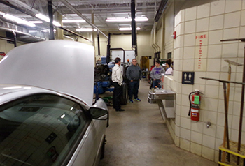 Students in the auto garage classroom
