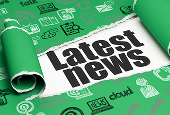 Latest News printed on green paper