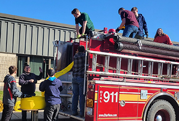 Students around a fire truck
